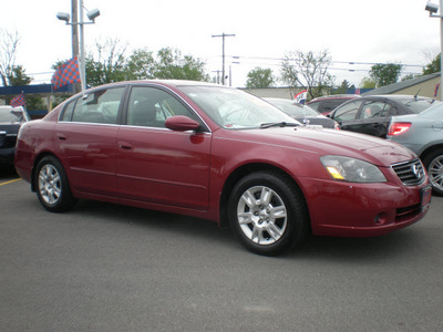 nissan altima 2006 red sedan gasoline 4 cylinders front wheel drive automatic 13502