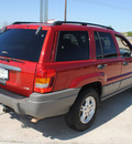 jeep grand cherokee 2002 red suv laredo gasoline 8 cylinders 4 wheel drive automatic with overdrive 76087