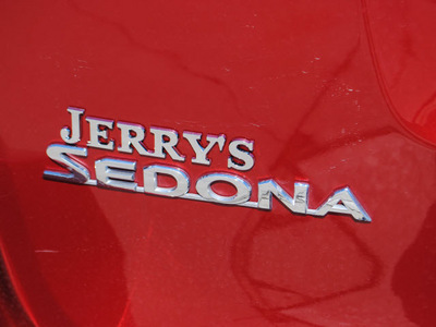 kia sedona 2011 red van gasoline 6 cylinders front wheel drive automatic 76087