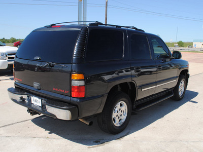 chevrolet tahoe 2005 black suv gasoline 8 cylinders 4 wheel drive automatic 76087