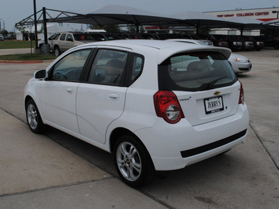 chevrolet aveo 2011 white hatchback lt gasoline 4 cylinders front wheel drive automatic 76087