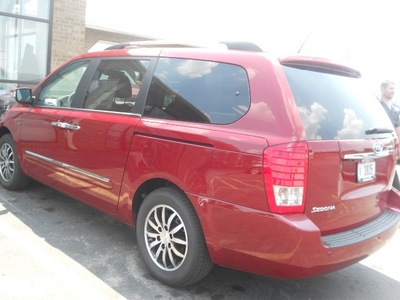 kia sedona 2012 red van ex gasoline 6 cylinders front wheel drive 6 speed automatic 43228