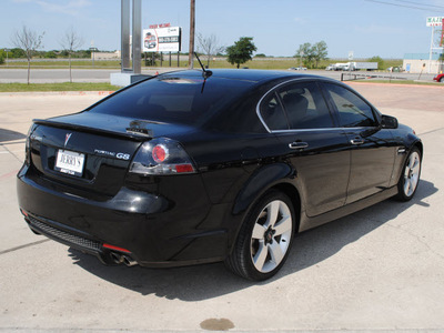 pontiac g8 2009 black sedan gasoline 8 cylinders rear wheel drive automatic 76087