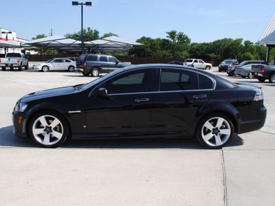 pontiac g8 2009 black sedan gasoline 8 cylinders rear wheel drive automatic 76087