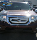 honda pilot 2009 maroon suv gasoline 6 cylinders all whee drive automatic 13502