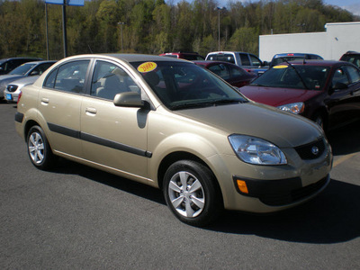 kia rio 2009 tan sedan gasoline 4 cylinders front wheel drive automatic 13502