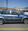 subaru impreza 2009 blue hatchback outback sport gasoline 4 cylinders all whee drive automatic 13502