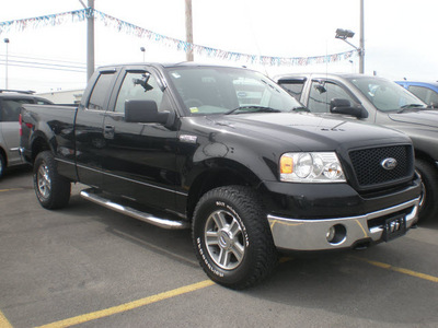 ford f 150 2006 black gasoline 8 cylinders 4 wheel drive automatic with overdrive 13502
