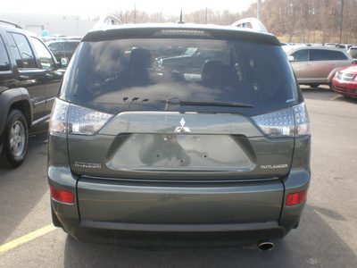 mitsubishi outlander 2009 green suv se gasoline 4 cylinders all whee drive automatic 13502