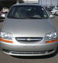 chevrolet aveo 2004 silver hatchback gasoline 4 cylinders front wheel drive automatic 13502