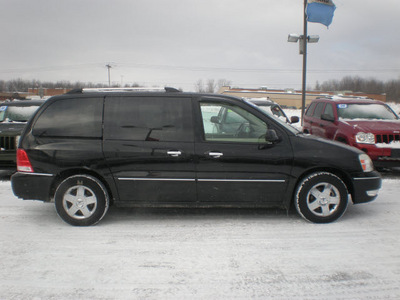 ford freestar 2006 black van limited gasoline 6 cylinders front wheel drive automatic 13502