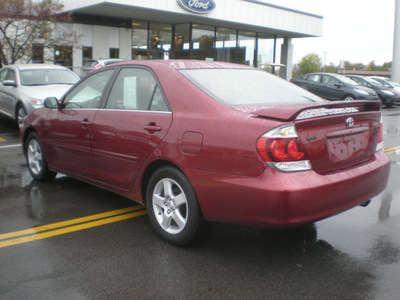 toyota camry 2005 red sedan gasoline 4 cylinders front wheel drive automatic with overdrive 13502