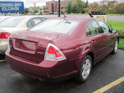 ford fusion 2007 red sedan se gasoline 6 cylinders all whee drive automatic 13502