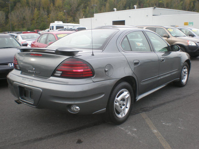 pontiac grand am 2003 gray sedan se gasoline 4 cylinders dohc front wheel drive automatic 13502