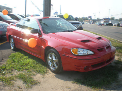 pontiac grand am 2003 red coupe gt gasoline 6 cylinders front wheel drive automatic 13502