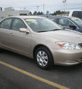 toyota camry 2004 tan sedan gasoline 4 cylinders front wheel drive automatic with overdrive 13502