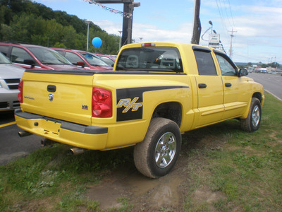 dodge dakota 2006 yellow slt gasoline 8 cylinders 4 wheel drive automatic 13502