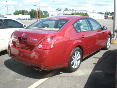 nissan maxima 2004 red sedan gasoline 6 cylinders front wheel drive automatic 13502