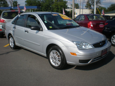 ford focus 2006 silver sedan zx4 gasoline 4 cylinders front wheel drive automatic with overdrive 13502