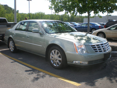 cadillac dts 2007 light green sedan gasoline 8 cylinders front wheel drive automatic 13502