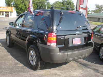 ford escape 2006 black suv xlt gasoline 6 cylinders all whee drive automatic with overdrive 13502