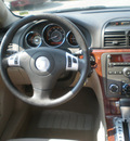 saturn aura 2007 tan sedan xe gasoline 6 cylinders front wheel drive automatic 13502