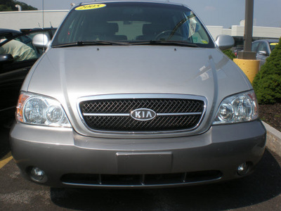 kia sedona 2005 silver van gasoline 6 cylinders front wheel drive automatic with overdrive 13502