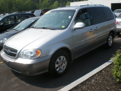 kia sedona 2005 silver van gasoline 6 cylinders front wheel drive automatic with overdrive 13502