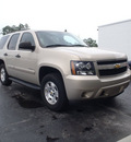 chevrolet tahoe 2009 gold suv ls gasoline 8 cylinders 2 wheel drive automatic with overdrive 28557
