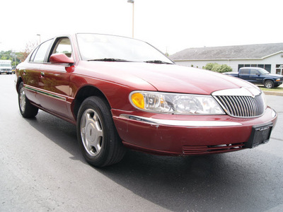 lincoln continental 1999 red sedan gasoline v8 dohc front wheel drive automatic 60098
