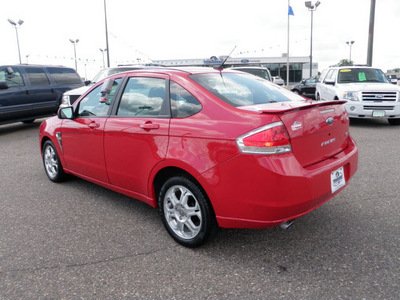 ford focus 2008 red sedan se 4dsr gasoline 4 cylinders front wheel drive automatic 56301