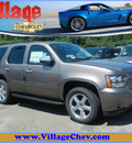 chevrolet tahoe 2011 brown suv ltz flex fuel 8 cylinders 4 wheel drive automatic with overdrive 55391
