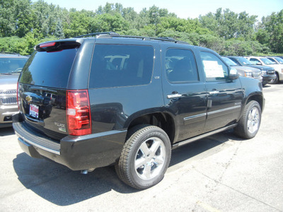 chevrolet tahoe 2011 black suv ltz flex fuel 8 cylinders 4 wheel drive automatic with overdrive 55391