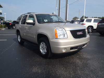 gmc yukon 2011 gold suv slt flex fuel 8 cylinders 2 wheel drive automatic with overdrive 28557