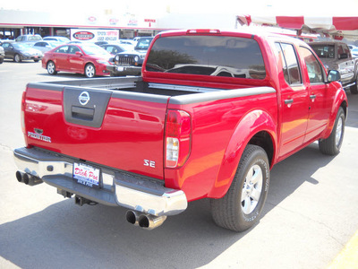 nissan frontier 2010 red gasoline 6 cylinders 2 wheel drive automatic 79925