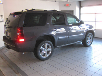 chevrolet tahoe 2011 dk  gray suv ltz dvd navi flex fuel 8 cylinders 4 wheel drive automatic with overdrive 55391