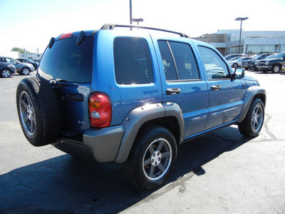 jeep liberty 2003 blue suv freedom edition gasoline 6 cylinders rear wheel drive automatic with overdrive 55420