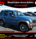 jeep liberty 2003 blue suv freedom edition gasoline 6 cylinders rear wheel drive automatic with overdrive 55420