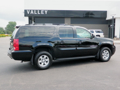 gmc yukon xl 2007 black suv slt 1500 4wd flex fuel 8 cylinders automatic 55124