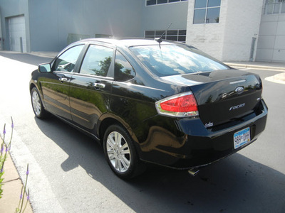 ford focus 2010 black sedan sel gasoline 4 cylinders front wheel drive automatic with overdrive 55448