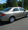 toyota corolla 2010 tan sedan le gasoline 4 cylinders front wheel drive automatic 55448