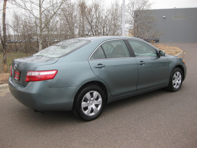 toyota camry 2009 green sedan le gasoline 4 cylinders front wheel drive automatic 55448