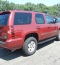 chevrolet tahoe 2011 red suv lt 4x4 dvd flex fuel 8 cylinders 4 wheel drive automatic with overdrive 55391