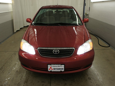 toyota corolla 2005 red sedan le gasoline 4 cylinders front wheel drive automatic 44060