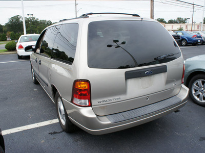 ford windstar 2003 gold van lx standard gasoline 6 cylinders front wheel drive automatic with overdrive 08753