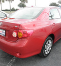 toyota corolla 2010 red sedan le gasoline 4 cylinders front wheel drive automatic 34474