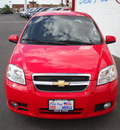 chevrolet aveo 2010 red sedan lt gasoline 4 cylinders front wheel drive automatic 79925