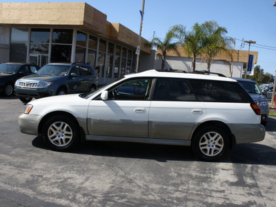 subaru outback 2001 white wagon limited gasoline 4 cylinders all whee drive 5 speed manual 94063
