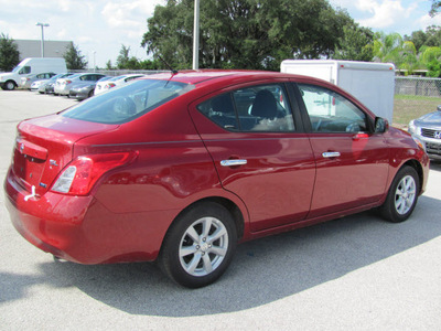 nissan versa 2012 red sedan sl gasoline 4 cylinders front wheel drive automatic 33884