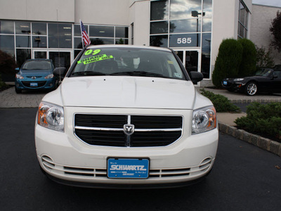 dodge caliber 2009 white hatchback sxt gasoline 4 cylinders front wheel drive automatic 07702